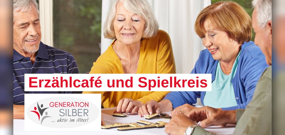 Menschen, die an einem Tisch sitzen und spielen. Menschen, die an einem Tisch sitzen und spielen.